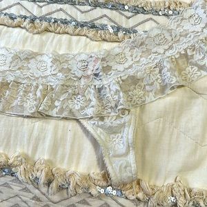 VS Sexy Little Things ruffle thong. White lace. Size L
